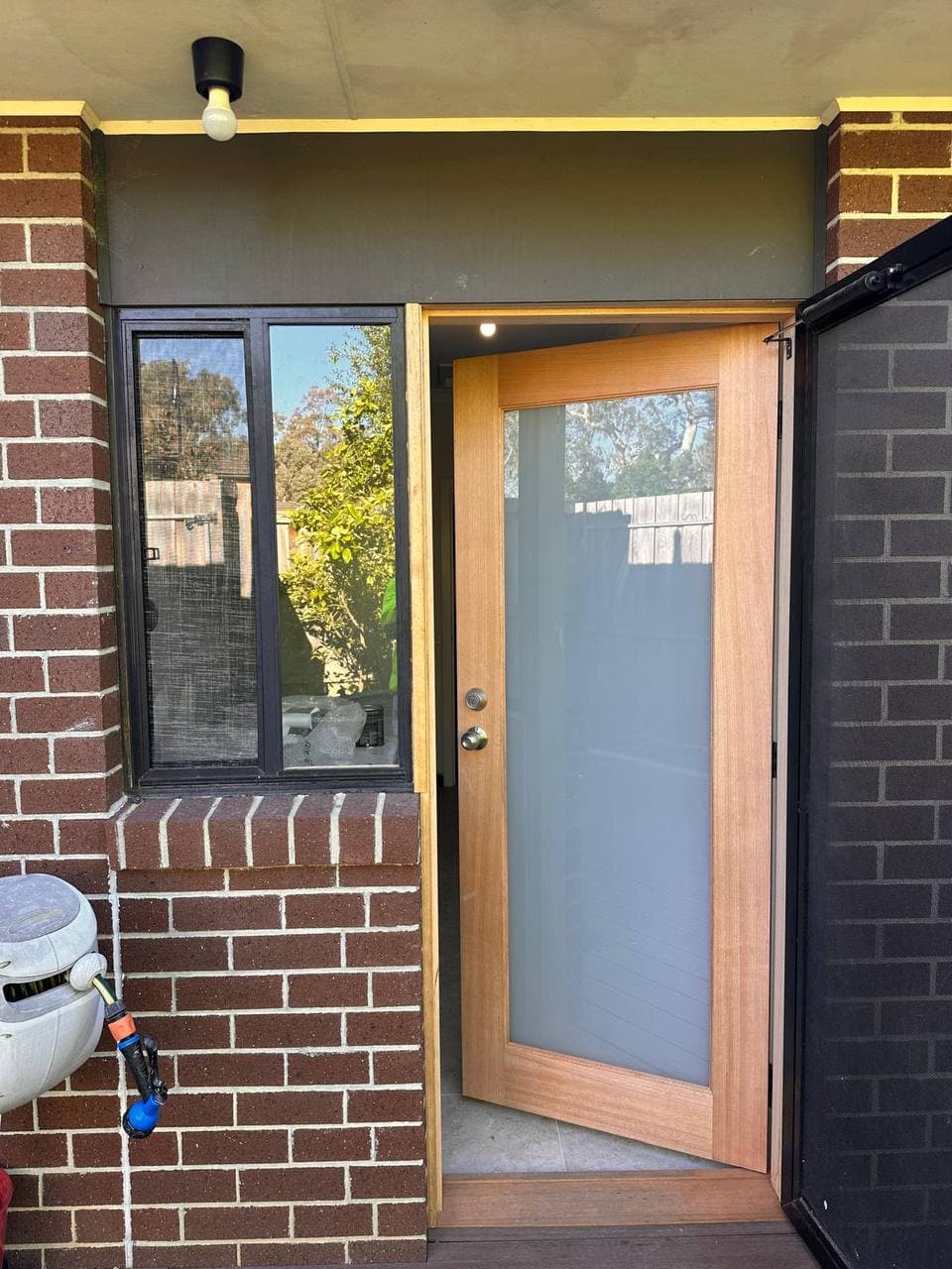 Front Entry Door — Gloss Black before